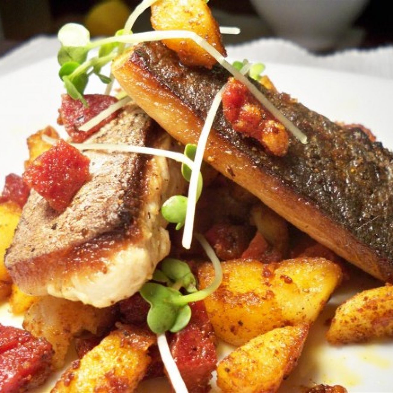 Grilled mackerel with potato and chorizo hash