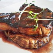 Grilled pork chop on apple blue cheese tart with red wine sauce (Custom)