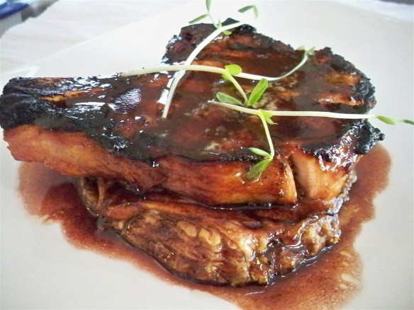 Grilled pork chop on apple blue cheese tart with red wine sauce (Custom)