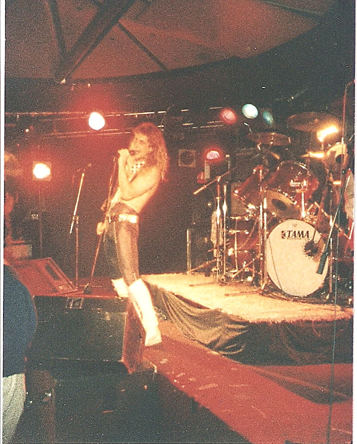 Randy Bailey performing as the frontman of Unchained.