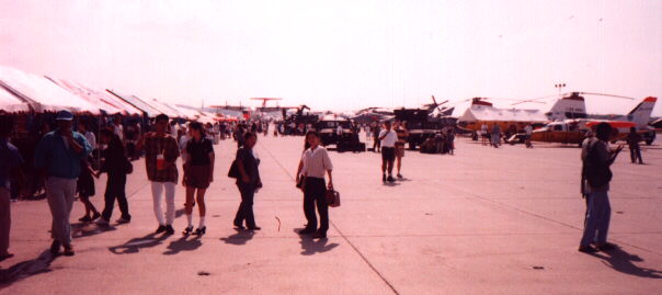 People and aircraft on the tarmac.