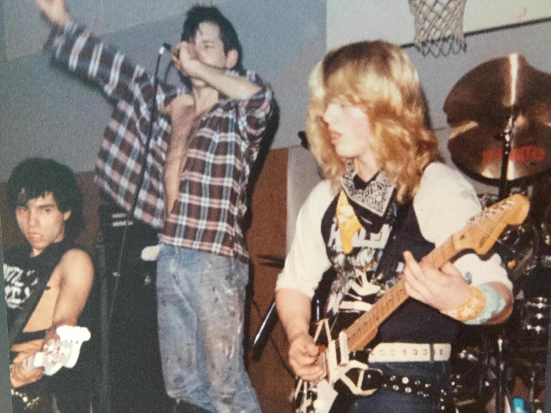 Benny Doro playing his striped guitar during the performance