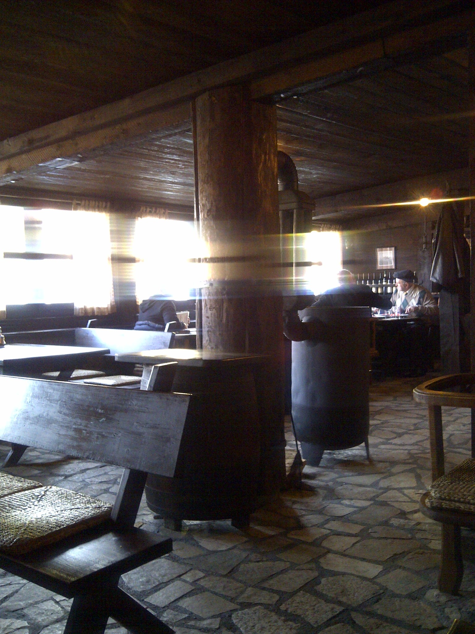 A wood-lined restaurant dining room