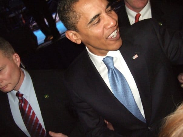 A close view of Barack Obama at the Youth Ball with other attendees nearby