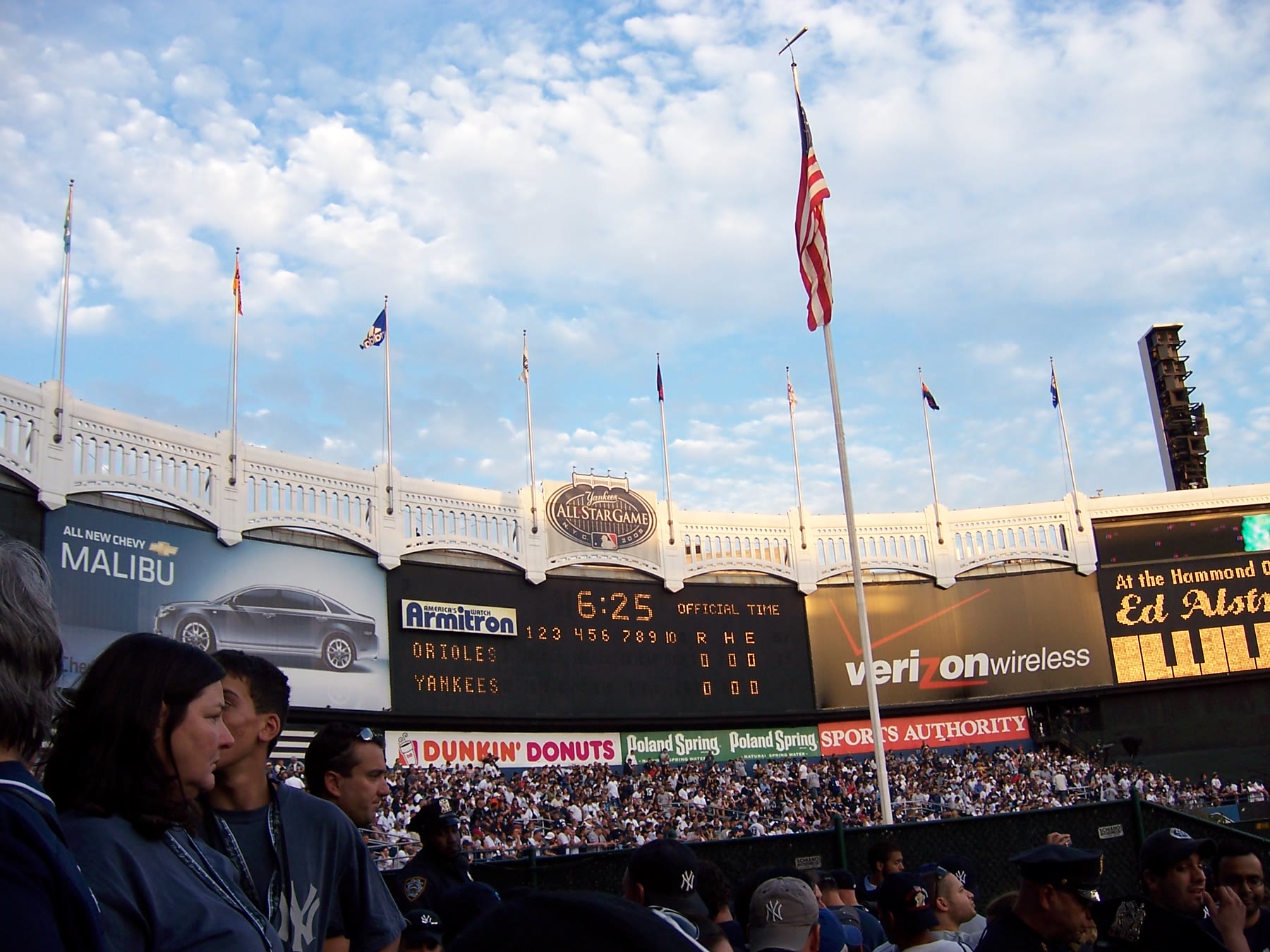 Flags, scoreboard and historic frieze inside the original Yankee Stadium before its final game