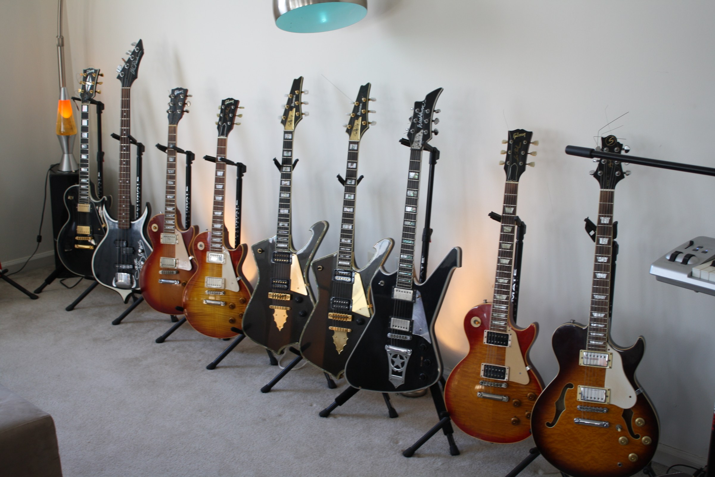 A long row of electric guitars inside Benny Doro's West New York studio