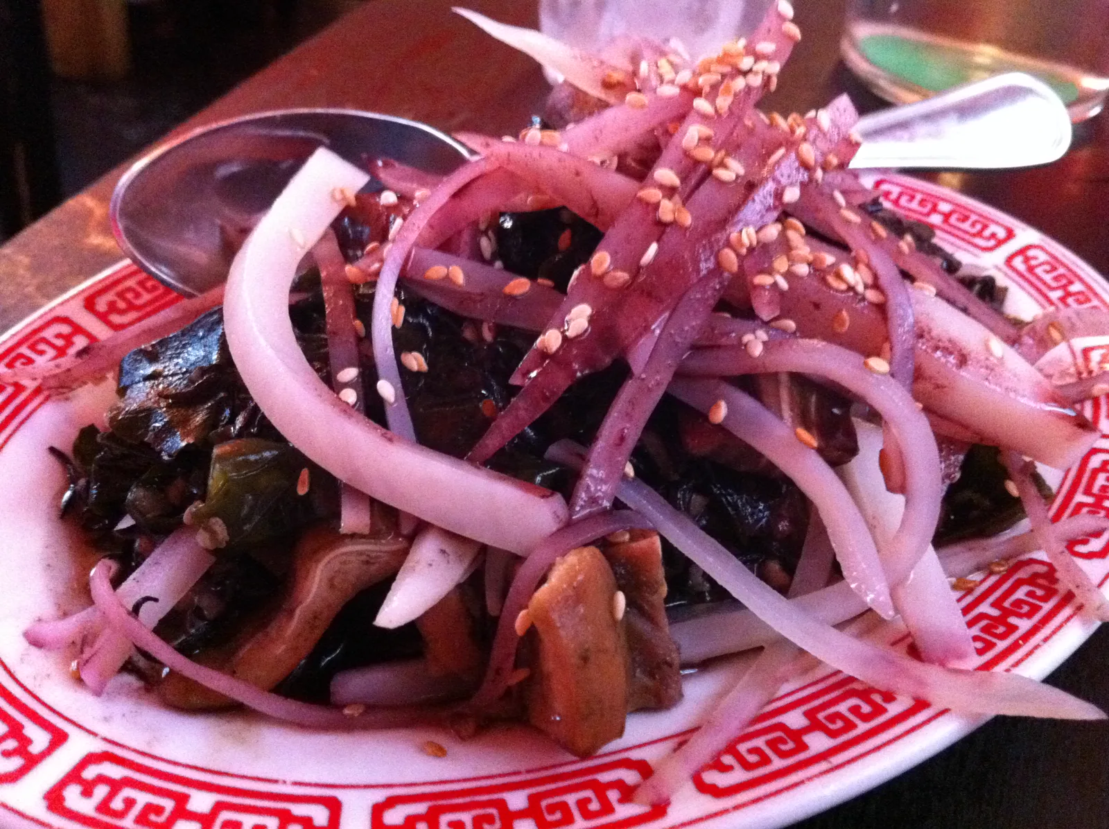 Close view of the onion and sesame-topped dish