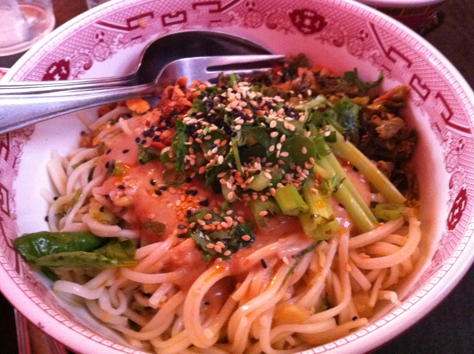 Noodle bowl with greens and sesame