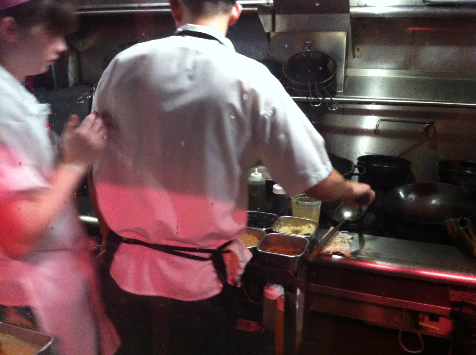 Cooks working in the open kitchen