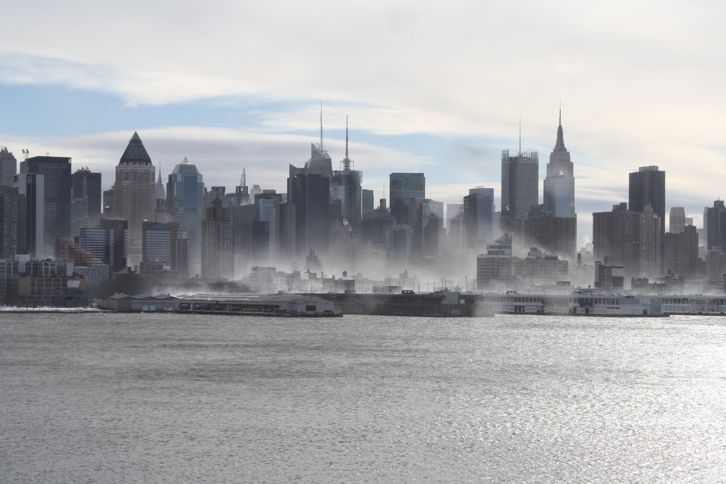 Manhattan skyline emerging through winter haze after the New York storm of 2010
