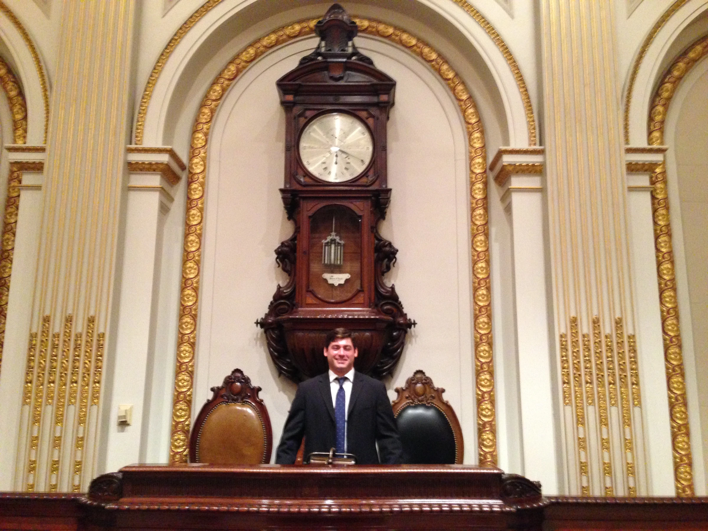 Adam standing inside the historic NYSE boardroom