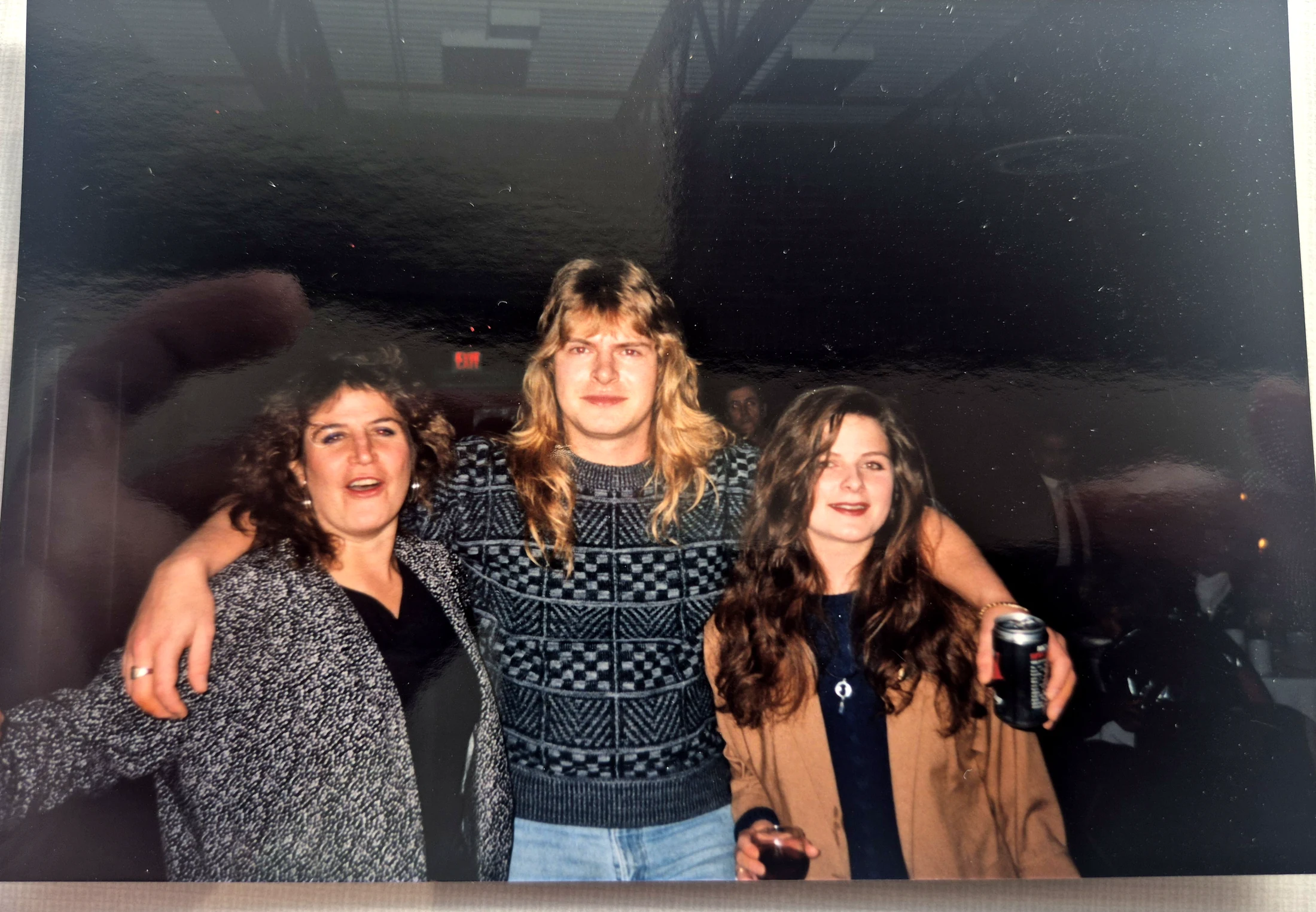 Jeff Worobec standing with Sharene Erickson-Baltzer and Nina Cramer.