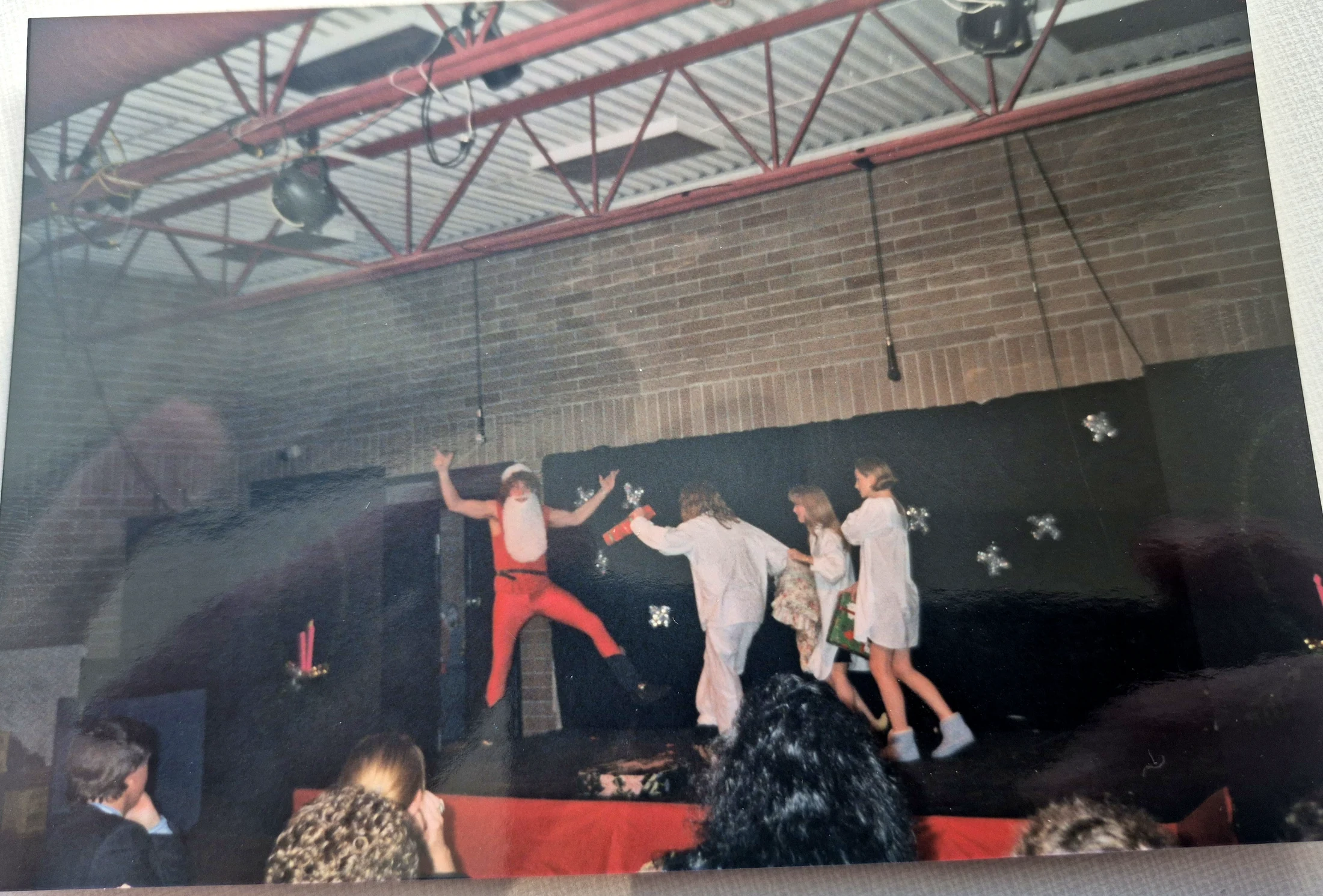 The Christmas cast performing together.