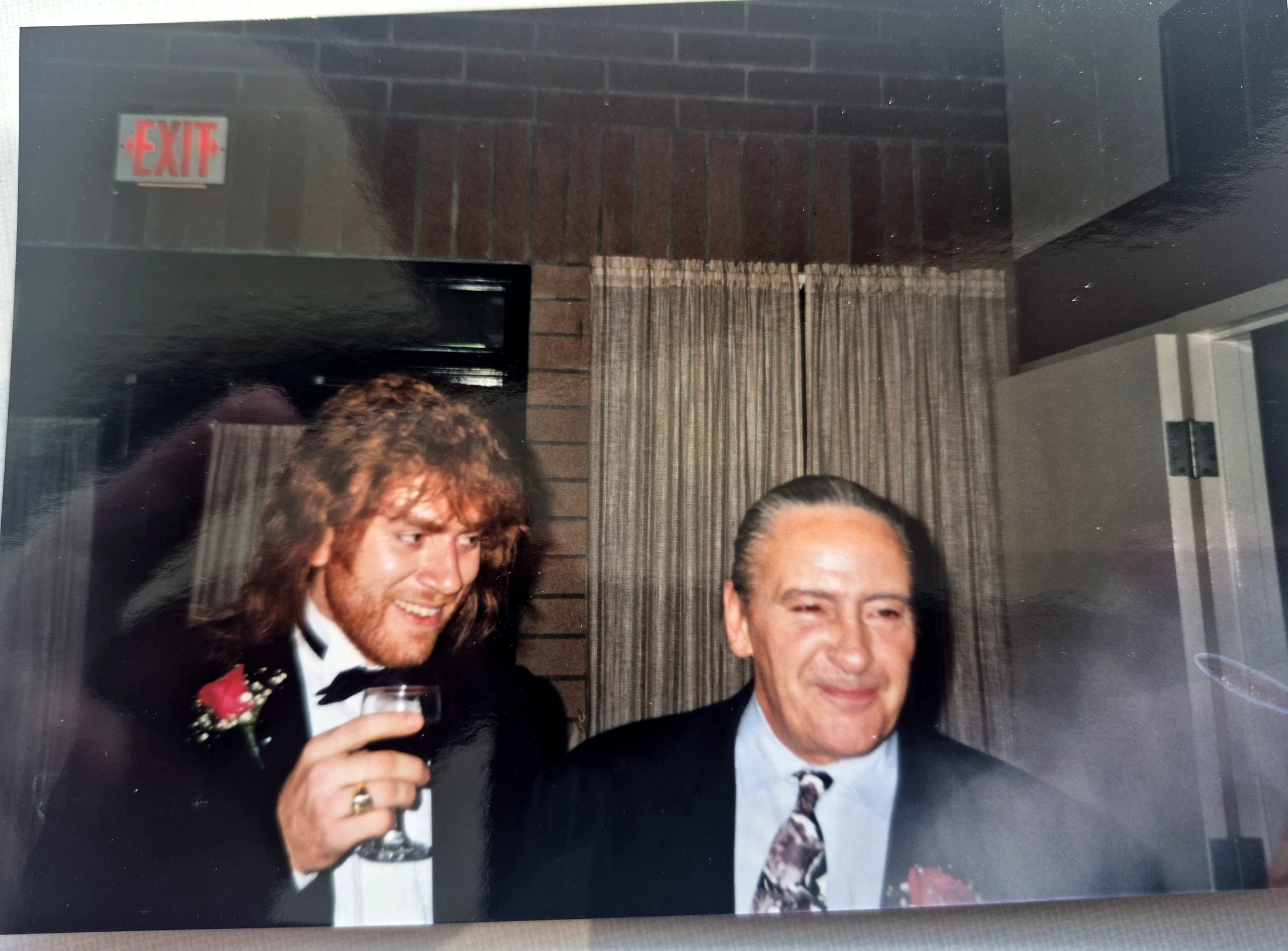 Tim Steinrock and James raising a glass.
