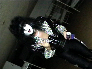 Benny Doro in Paul Stanley makeup in the dressing room, photograph 7 of 22