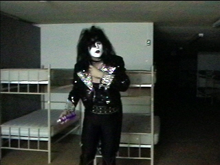 Benny Doro standing in costume in the dressing room, photograph 8 of 22
